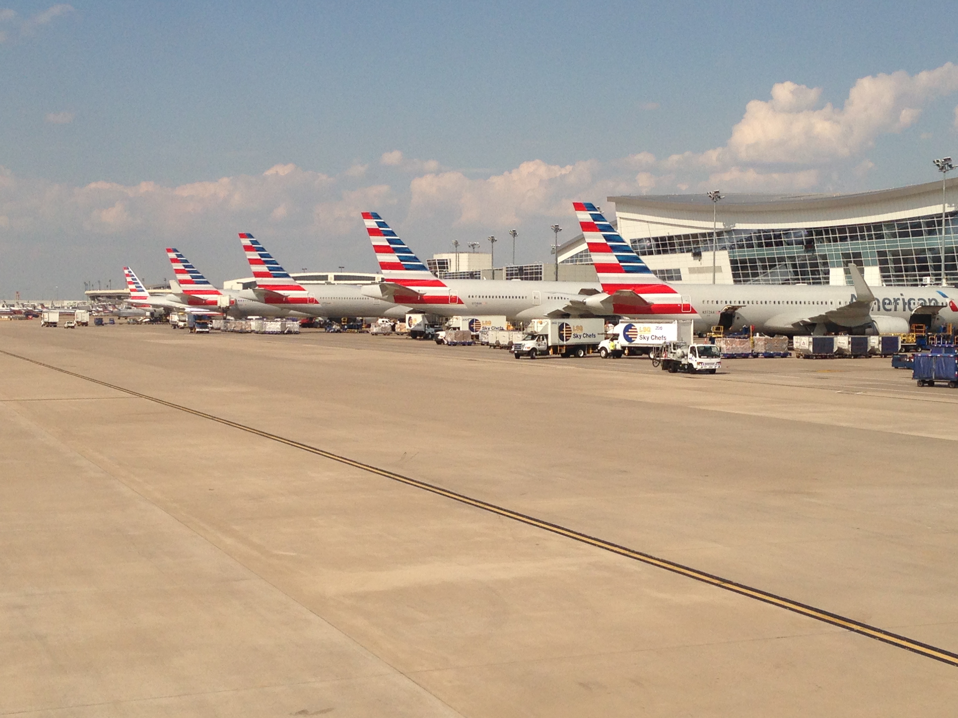 airplanes parked on a runway