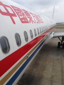 a plane with red and blue stripes